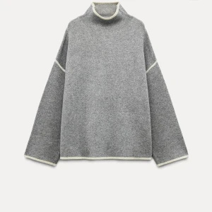 Grå stickad polotröja - Grå stickad polotröja med vita detaljer från Zara i storlek S 