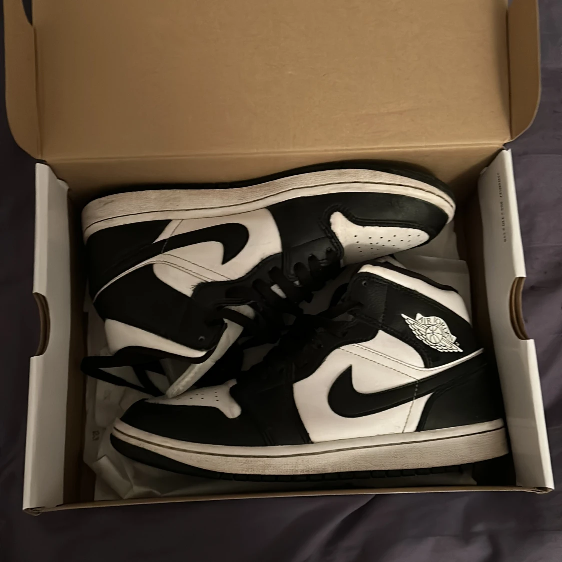 Nike Air Jordans i svart och vit