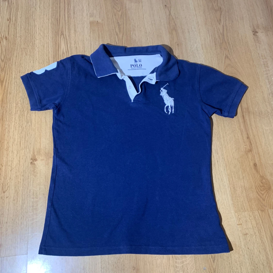 Blå pikétröja från Ralph Lauren