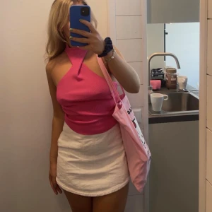 halterneck topp - rosa halterneck topp, skruvad både fram och bak. Inga defekter 