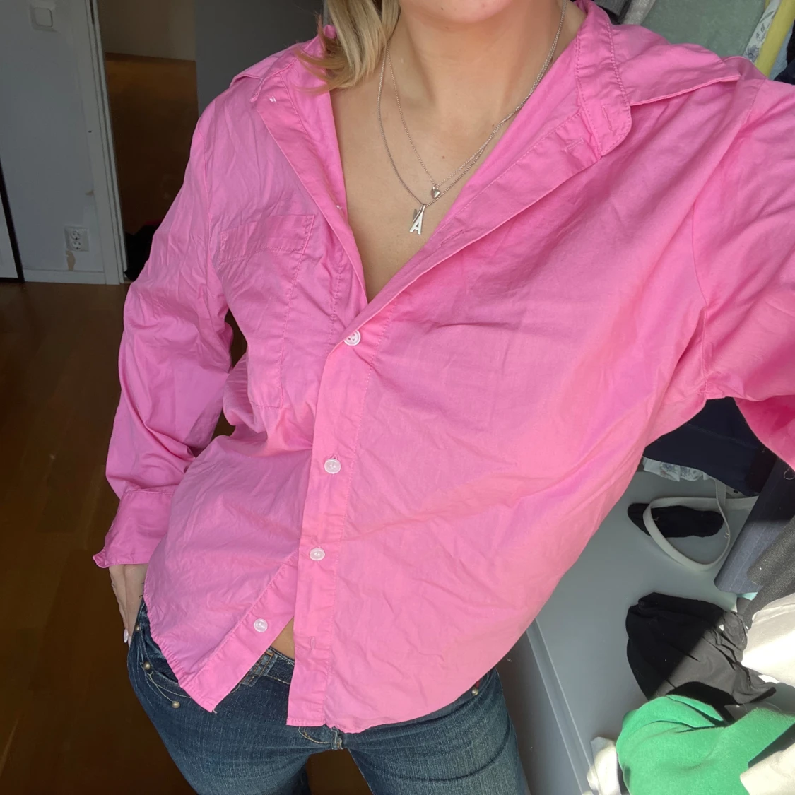 Rosa skjorta med knappar - 92