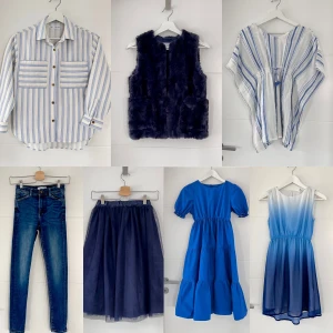 7 plagg i blått tema till tjej stl 140  - Säljer en uppsättning kläder till tjej stl 140 i tema blått! Skjorta + fuskpäls väst + tunika + jeans + tyllkjol (stl 128 stor i storlek) + två klänningar. märken: Name it, Zara, H&M