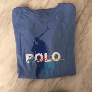 Ralph Lauren t-skirt - Blå Ralf Lauren t-skirt i storlek 160, 14-16 år. Fint skick