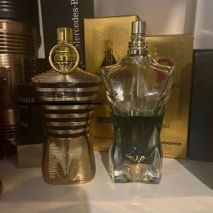 Le beau+le male elixir  - Säljer två parfymer. Båda är förvarade i en sval och mörk garderob. Jag behövde öppna le male elixir för att man kunde inte spraya eftersom att tråden gick av-se bild.  Le beau har ingenting så du får bara parfymen. Båda parfymernas vätska är som ny.
