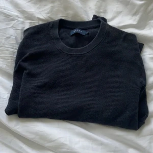 Sweatshirt Riley  - Storlek L men passar M