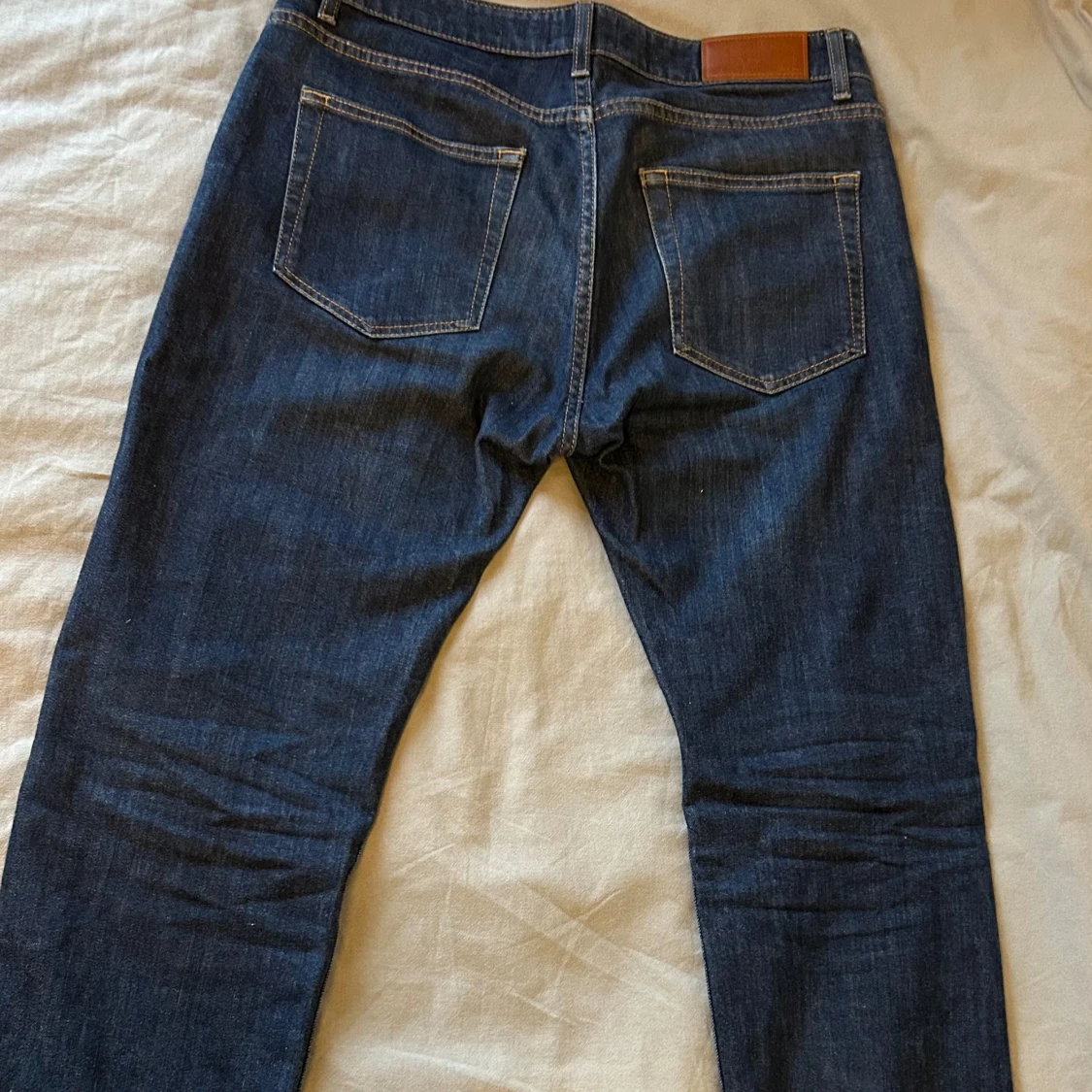 Mörkblå jeansbyxor - 2