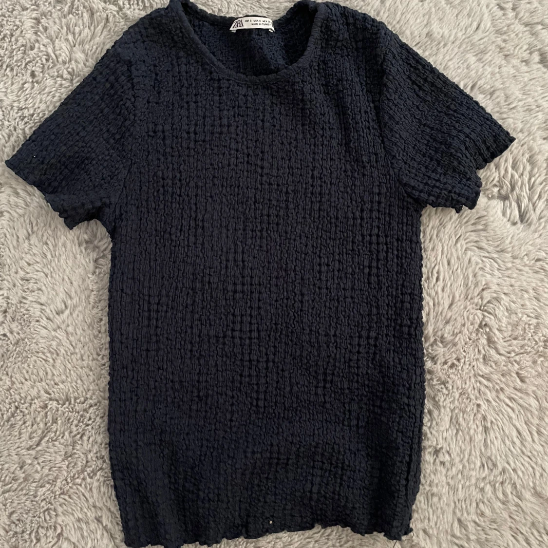 Svart ribbad topp från Zara