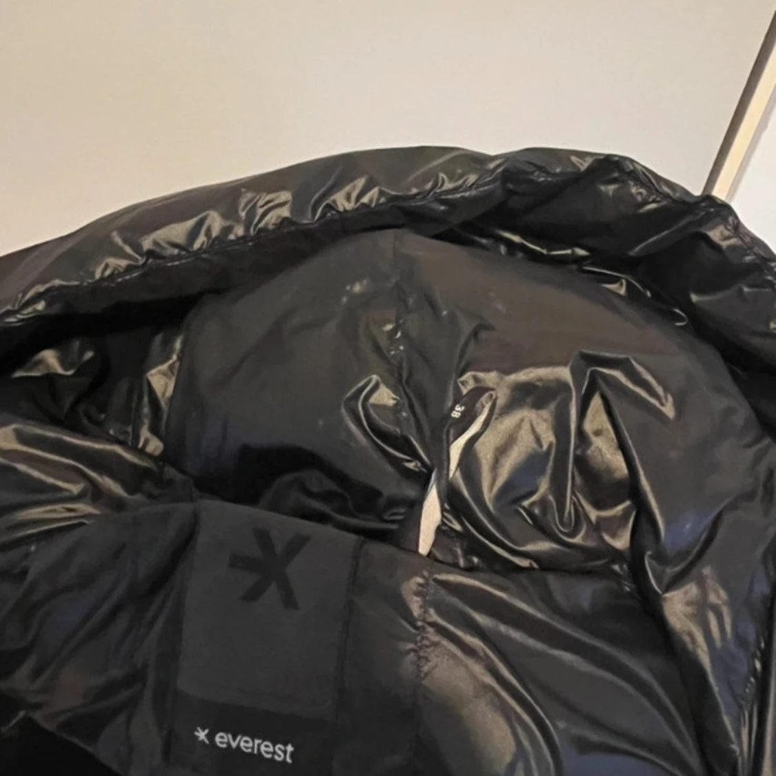 Svart dunjacka från Everest - 91