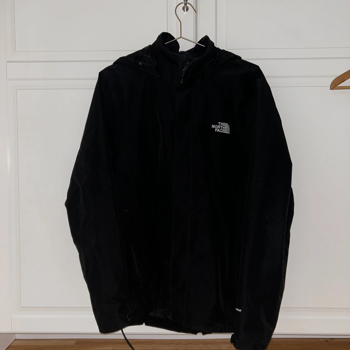 Svart regnjacka från The North Face