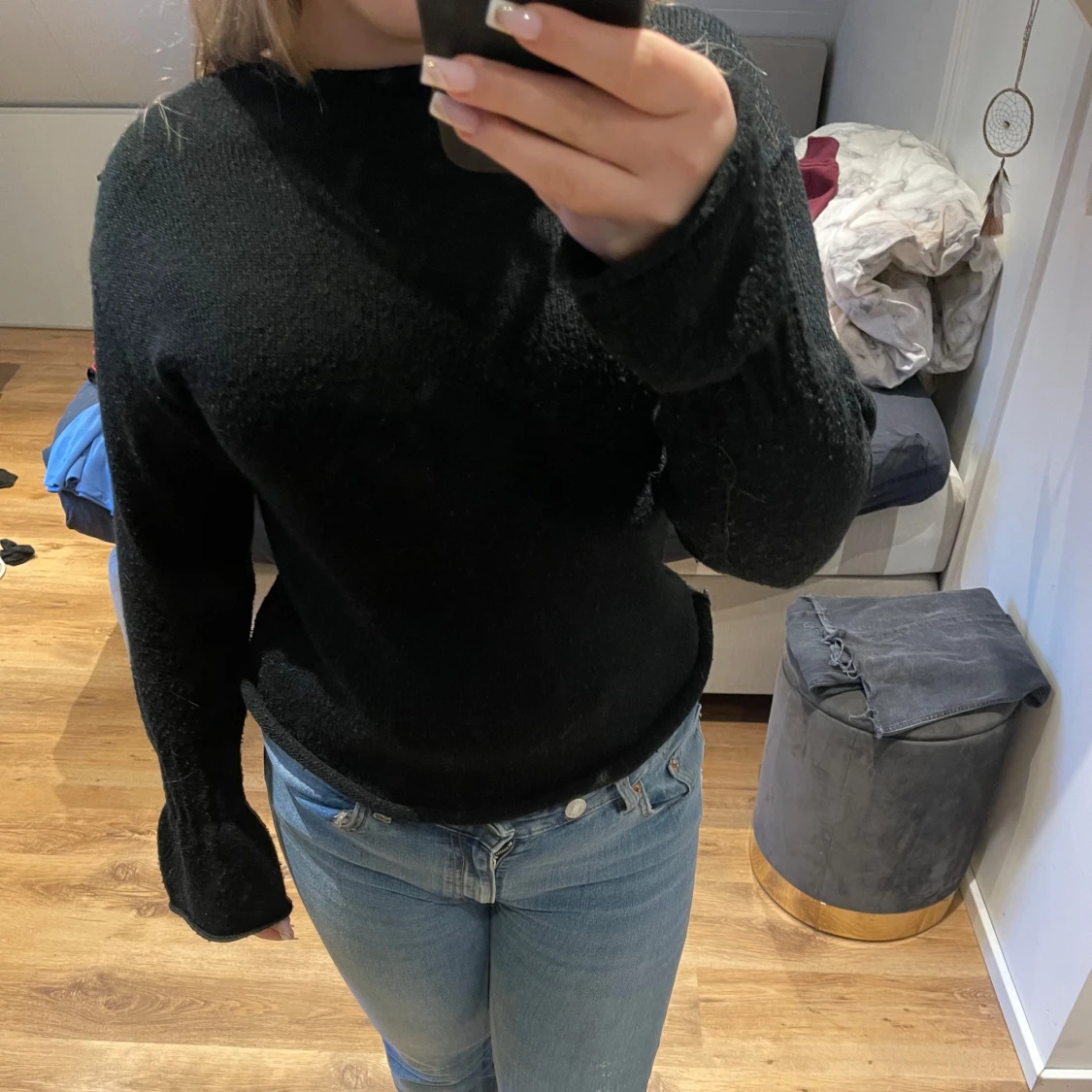 Svart stickad tröja