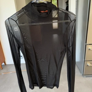 Mesh tröja  - Mesh tröja med krage. Står ingen storlek men den är som en s