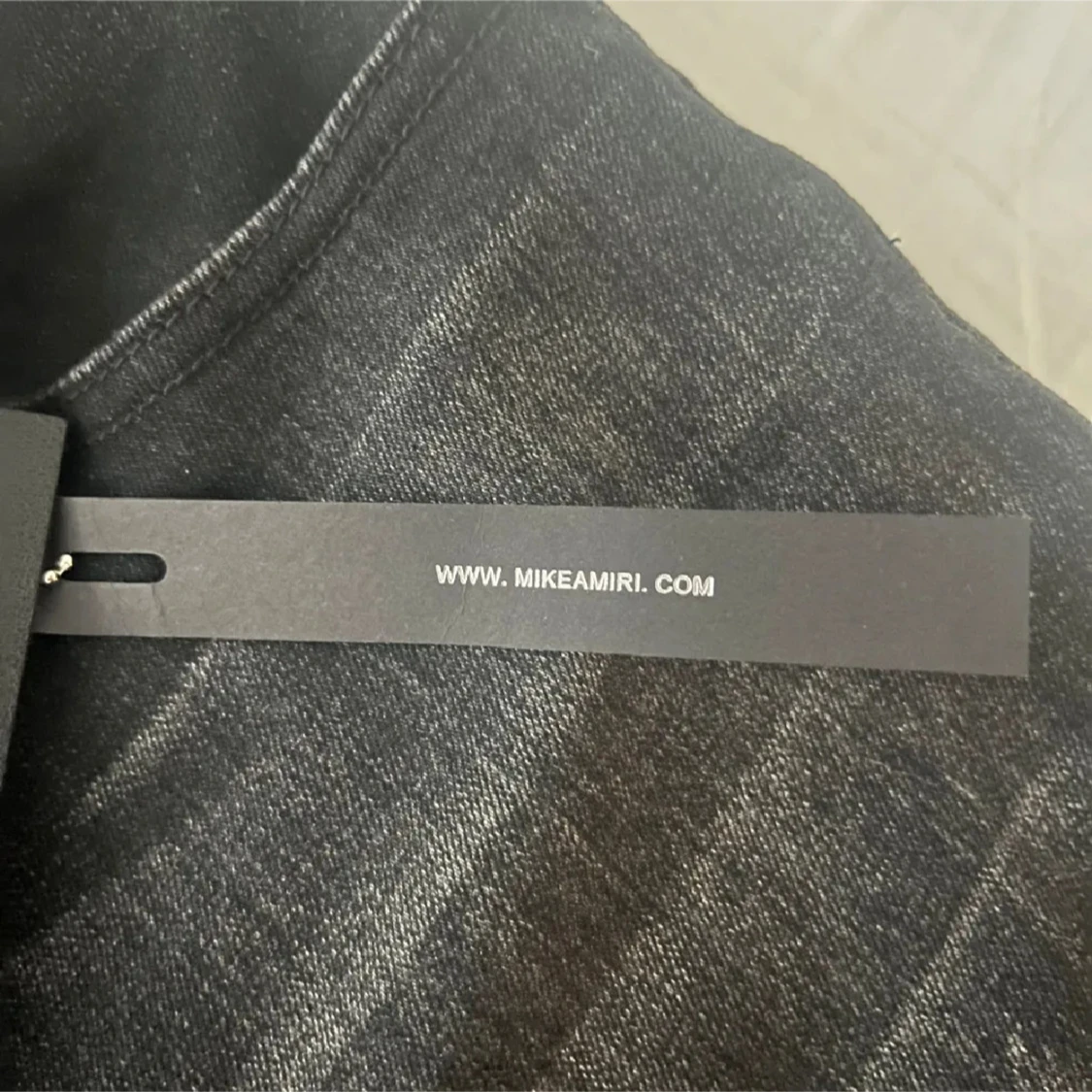 Svarta jeans med tryck från Amiri - 1