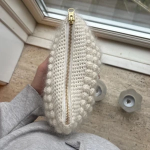 Clutch - Homemade clutch, can be made in diffrent colours too, the yarn is mohair and cotton and the fabric is liberty💕check my insta soegaard_studio
