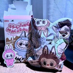 Exciting Macarons The Monsters Labubu - Lychee Berry Labubu Macaron from Pop Mart. Brand new & unopened bag, still in original blind bag  packaging. The box has been opened (not the bag) to check for the secret figure.  Bought from Popmart’s official website & can show you the receipt If you want proof. 