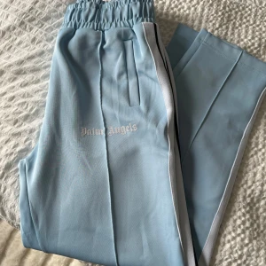 Palm angels byxor  - Palm angels byxor  Ljusblå Storlek L Inte Äkt@