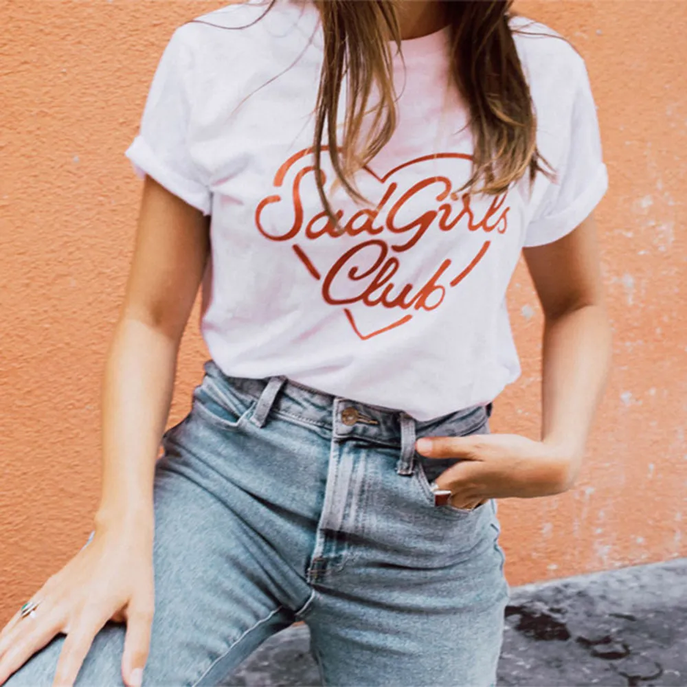 Sad Girls Club t-shirt designed exclusively by El Camello®. Unisex cut/Regular fit. Hand printed in small batches in Sweden. Size L. Shoulder: 48cm, bust: 57cm, length: 76cm. Model wears XS in the photo. . T-shirts.