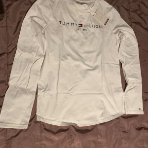 White Tommy Hilfiger Long Sleeve Shirt - Looks really good, brand new with tags.
