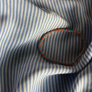 Ljusblått och orange armband, Alla storlekar ( elastiska band på alla armband)