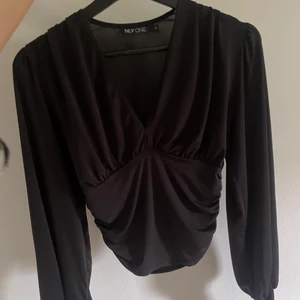 Tröja från NLY - Fin tröja från Nelly, aldrig använd