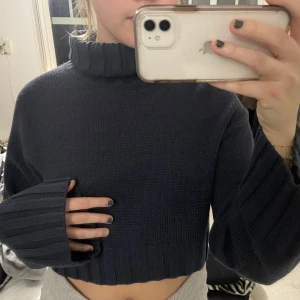 Polotröja  - Marinblå polotröja 