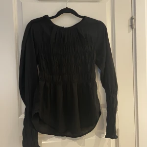 Topp - Skön topp med smickrande passform.