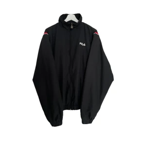Fila light jacket - Perfekt vintage skick inga som helst brister! Storlek medium på lappen sitter som en boxy medium/large 