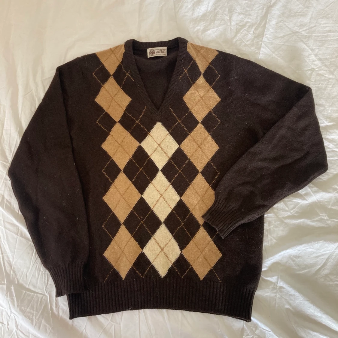 Stickad rutig tröja