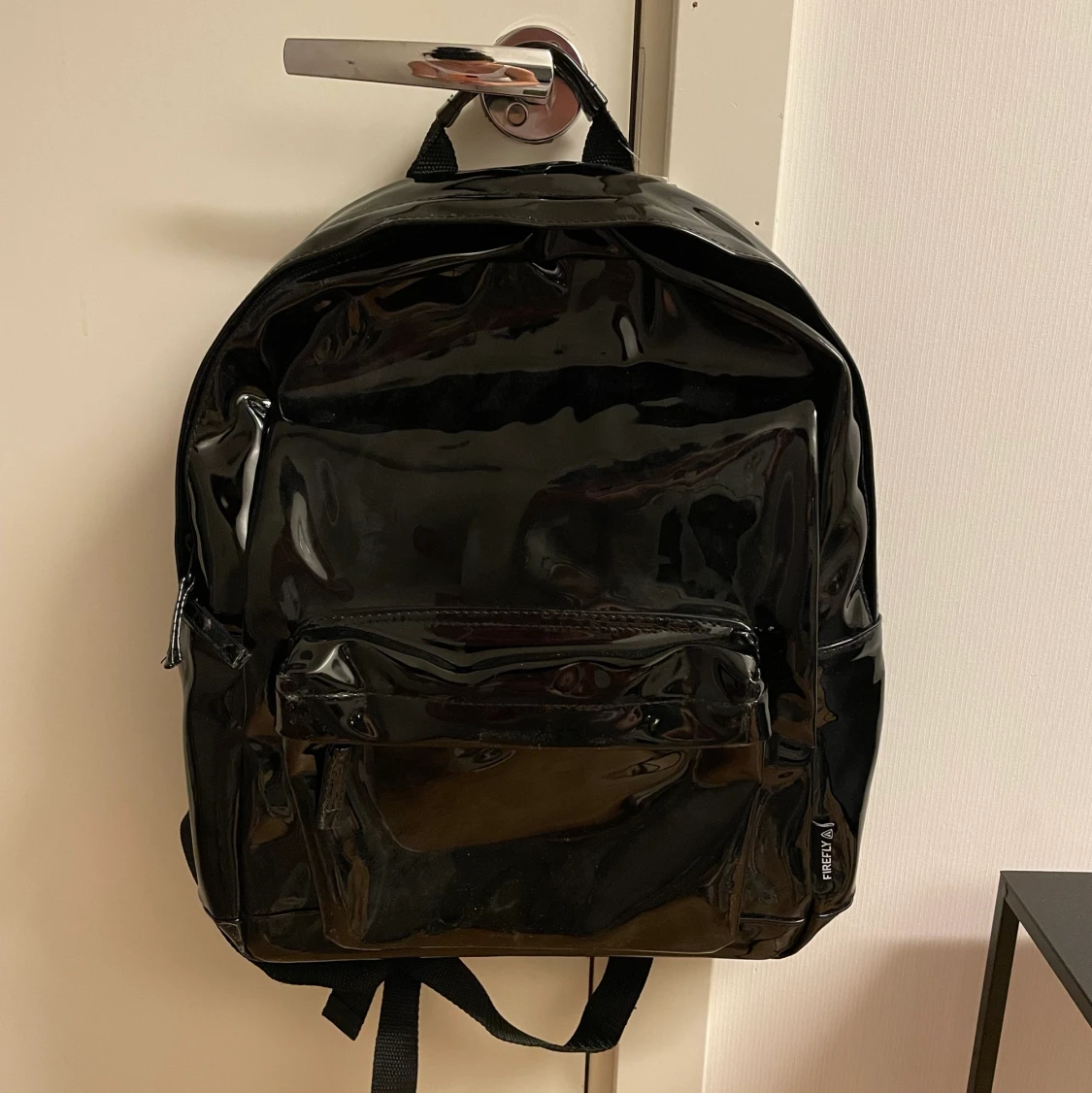 Ryggsäck m lappar kvar