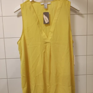 Linne  - Gult linne. Oanvänd 