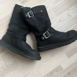 UGG winter boots - Leather material makes them more unique that the typical suede. Warm and comfortable.