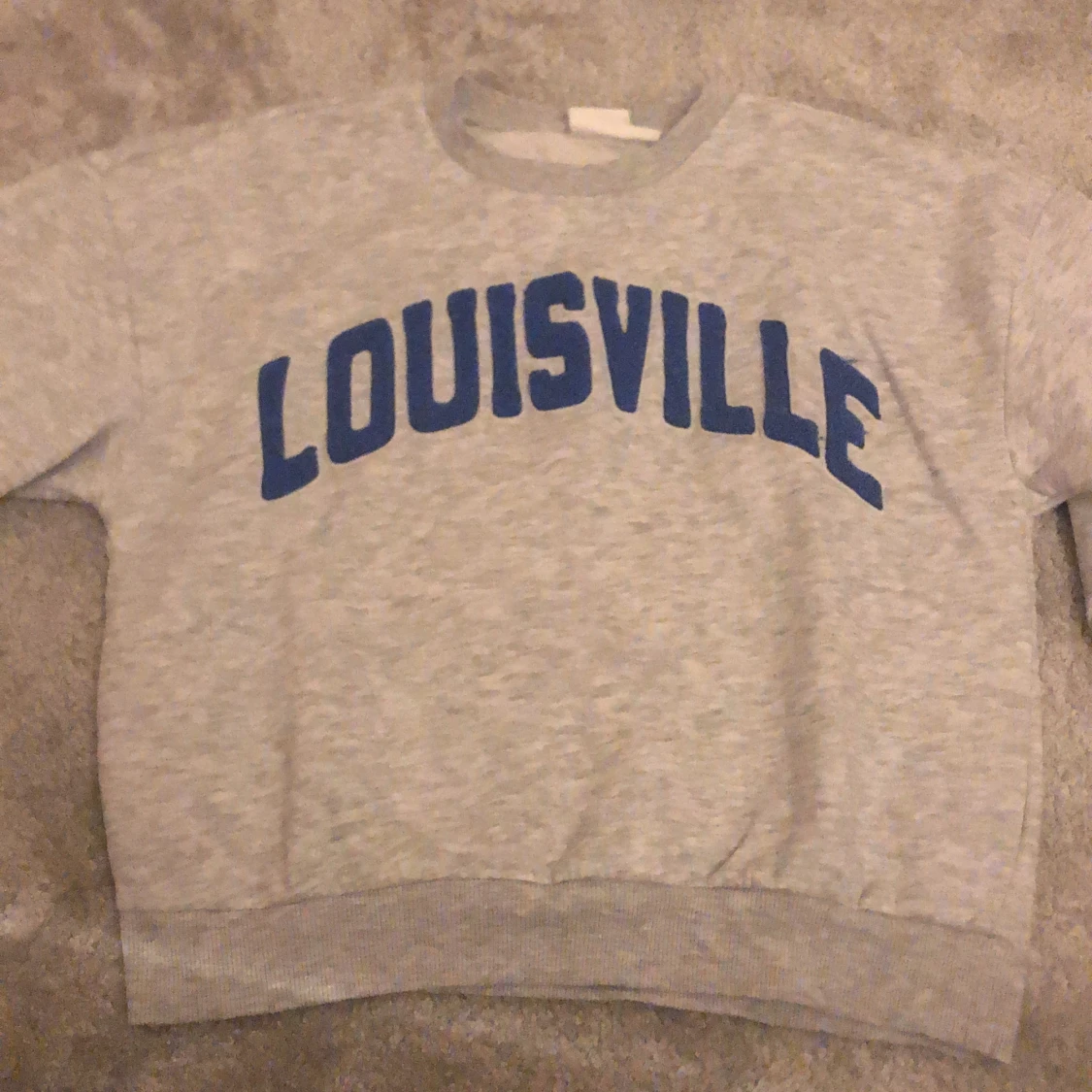 Louisville mjukiströja 