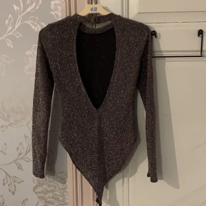 Glittrig body  - Fint skick använd några gånger 