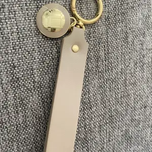 Super cute never used brand new Burberry key chain in cream beige colour! 