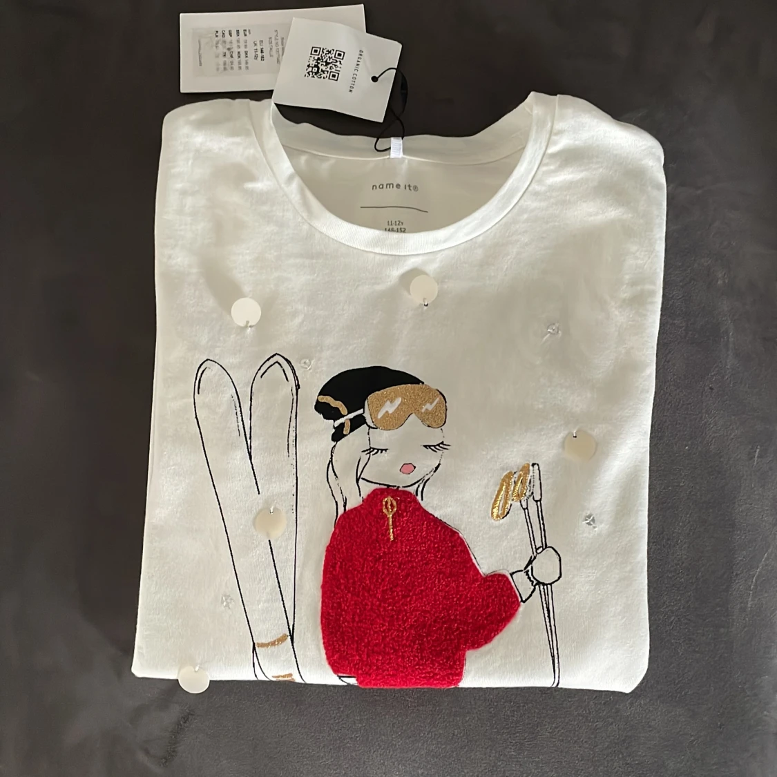 en Långärmad tröja storlek 146/152 - 90