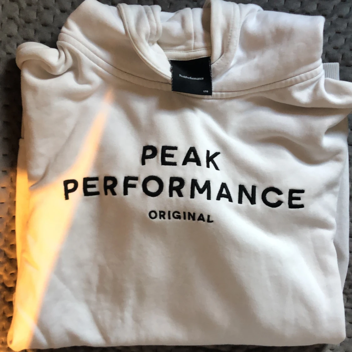 Hoodie från Peak Performance stl 170 - 91