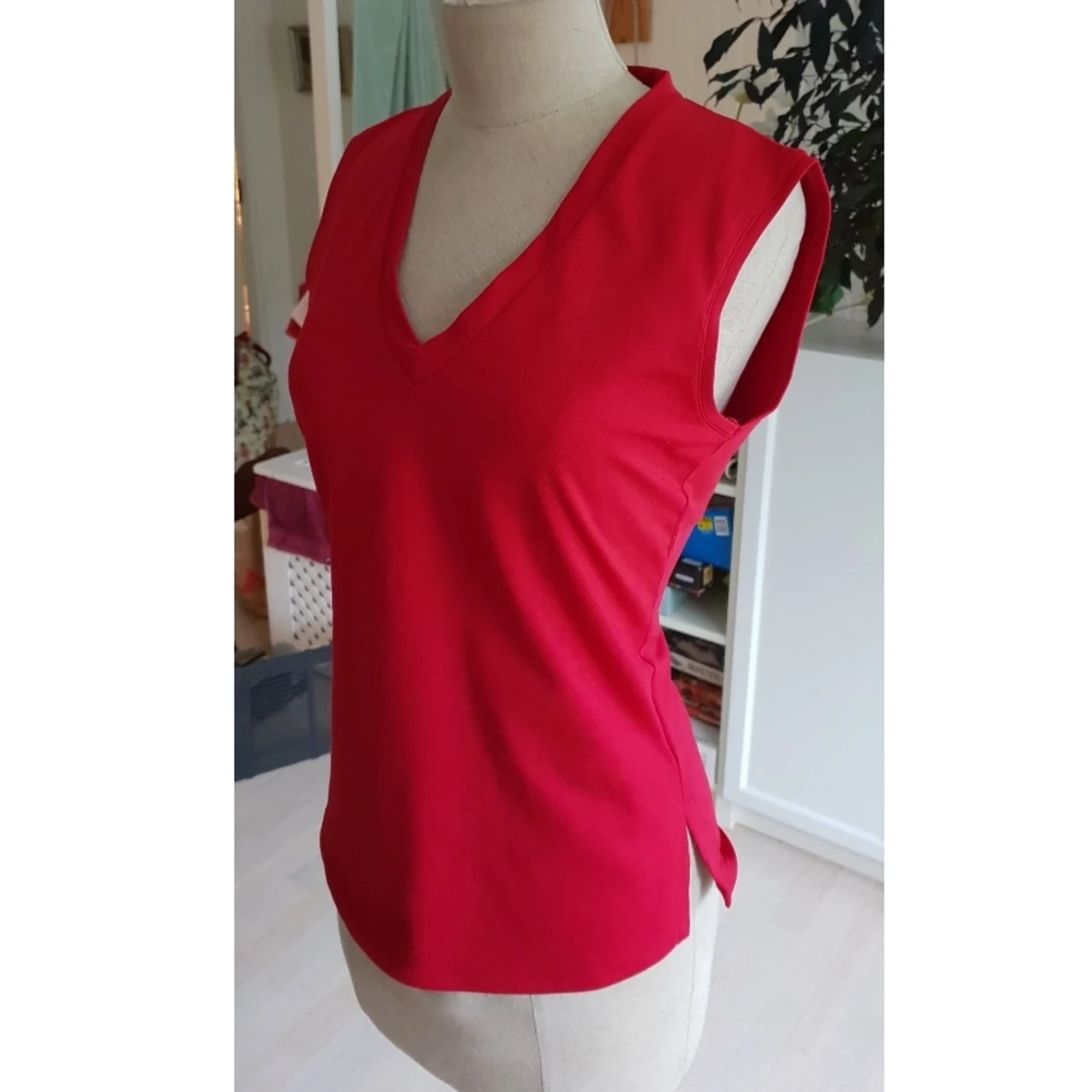 Rött linne/väst S/m - 90