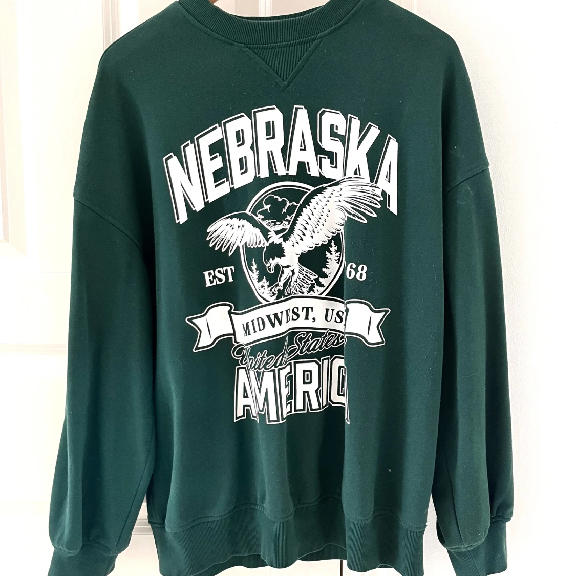 Mörkgrön tjocktröja med tryck H&M