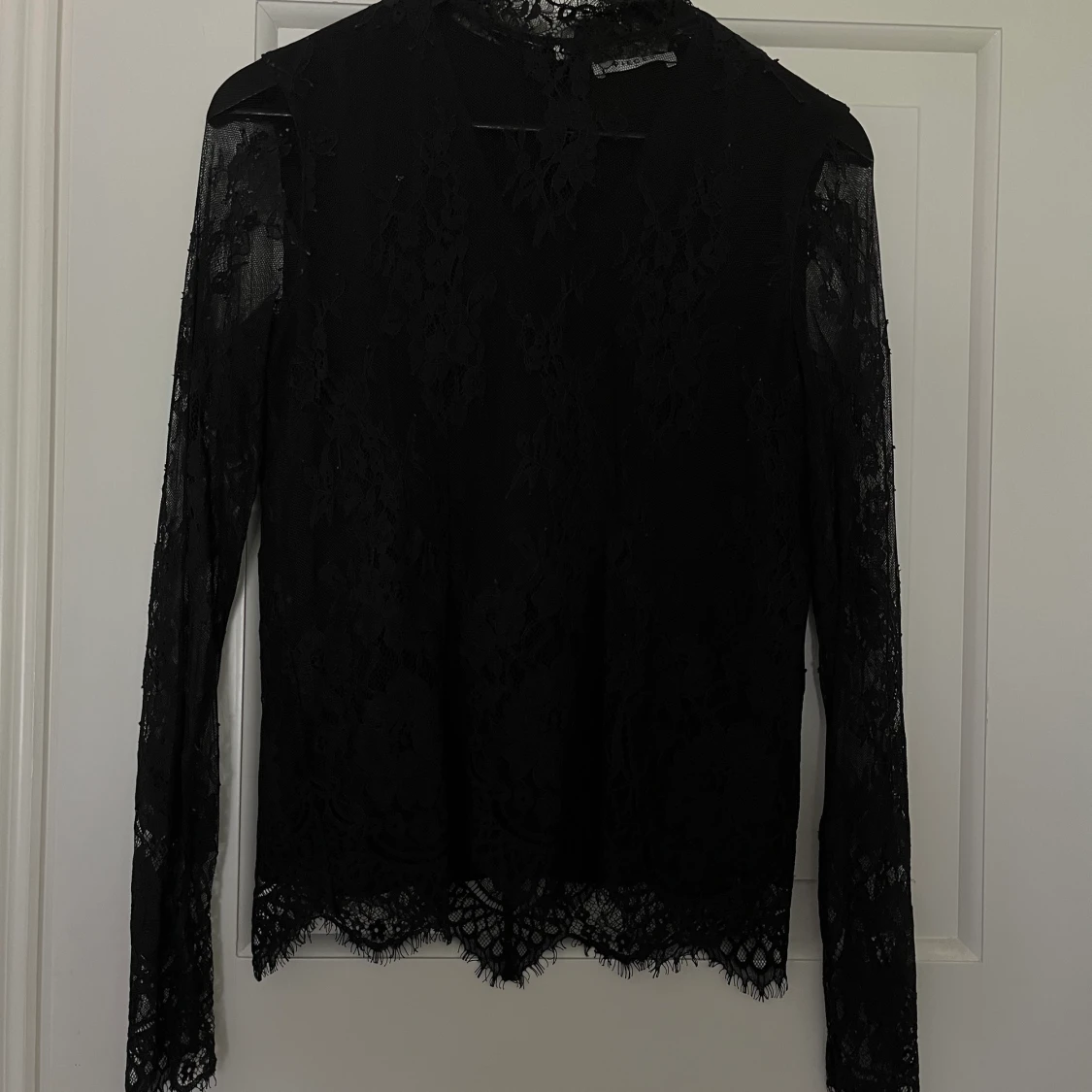 Spetstopp i svart storlek S