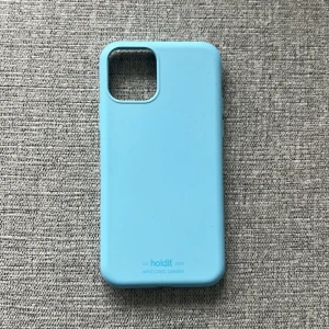 Mobilskal - ett iPhone 11 PRO holditskal i ett super skick, älskar det