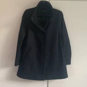 Kappa av ull - 75% ull mörkblå