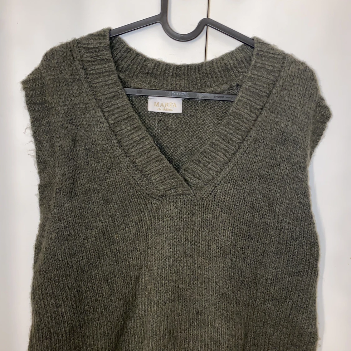 Stickad väst strl M
