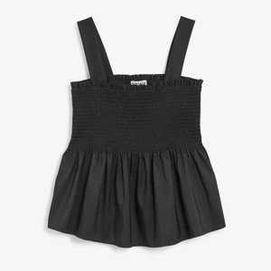 Svart topp - Fint svart linne, materialet är lite speciellt men väldigt bekvämt! Kommer inte till användning🤍