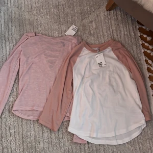 Nya rosa tröjor - 2 st oanvända tröjor med lappar kvar ena är strl S och den andra M men dividend så skulle säga att den är mer som en S 60kr för båda 