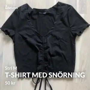 Ny T-shirt med knytning fram  50kr Kontakta för att köpa