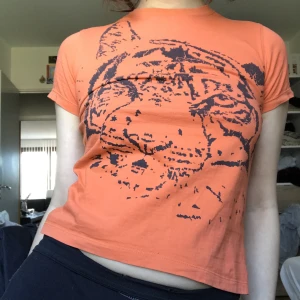 Orange tiger topp - Bra skick! Tror det är barnmodell 