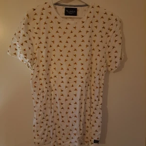 Bondelid T-shirt  - T-shirt från Bondelid med fasaner, knappt använd, stl L 
