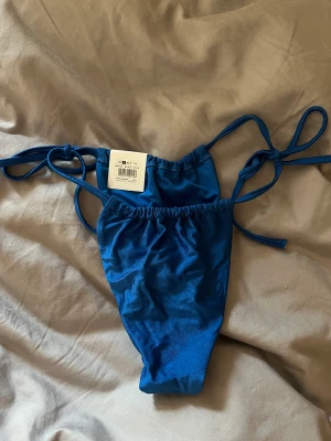 Bikiniunderdel - Bikiniunderdel från Bikbok strl s aldrig använd. Säljer för 70kr.