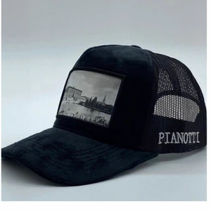 Pianotti  - Söker en sån keps som på bilden.