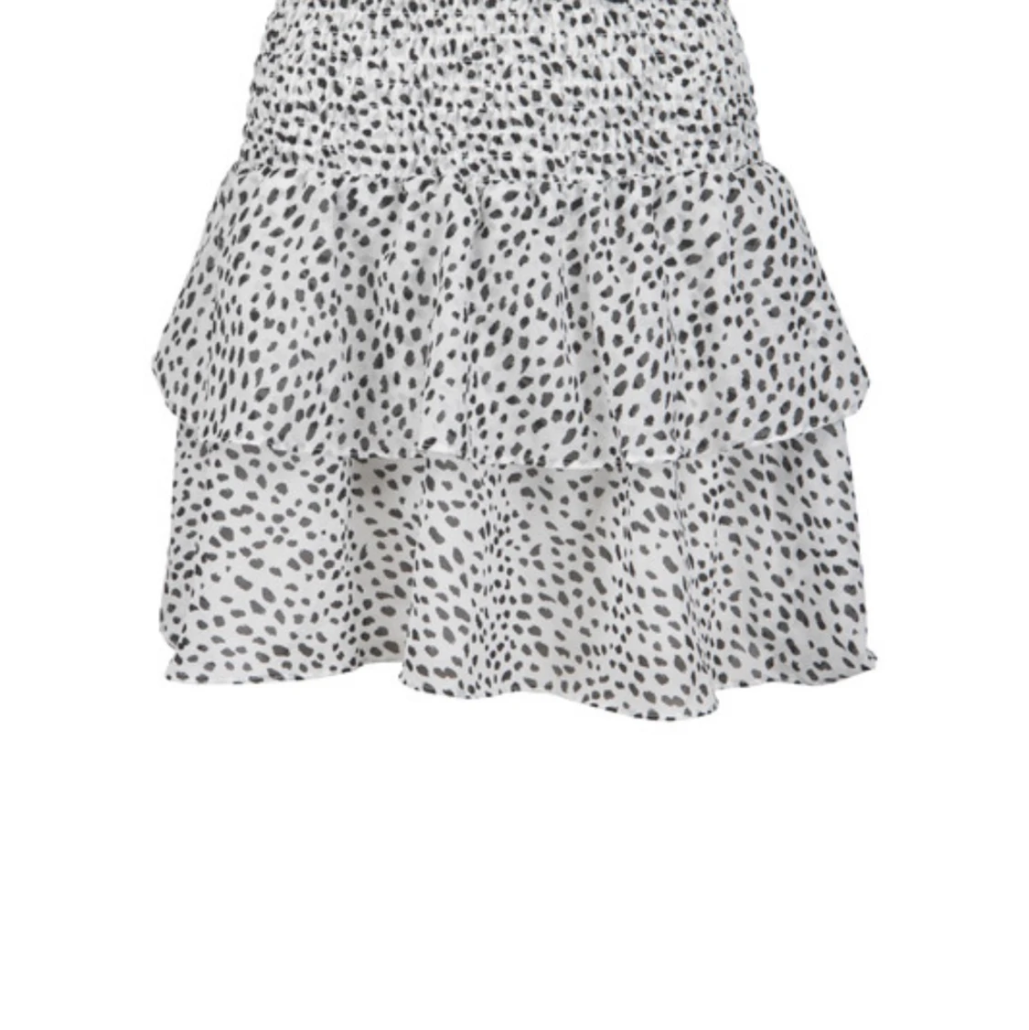 Vit prickig chelsea kjol