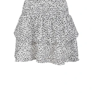 Vit prickig chelsea kjol - bra skick och använts ett antal gånger